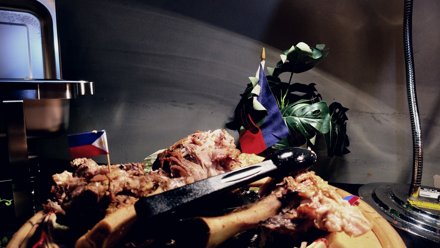 The lechon, with a flag in it